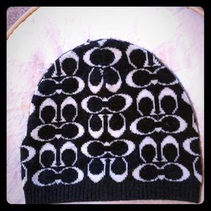 Coach 100% merino wool skull cap style beanie.